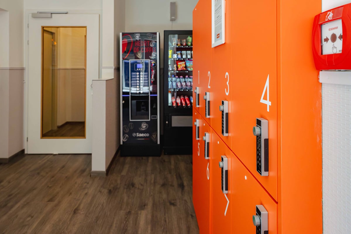 EasyHotel Zurich Limmatplatz reception area with vending machines and lockers.