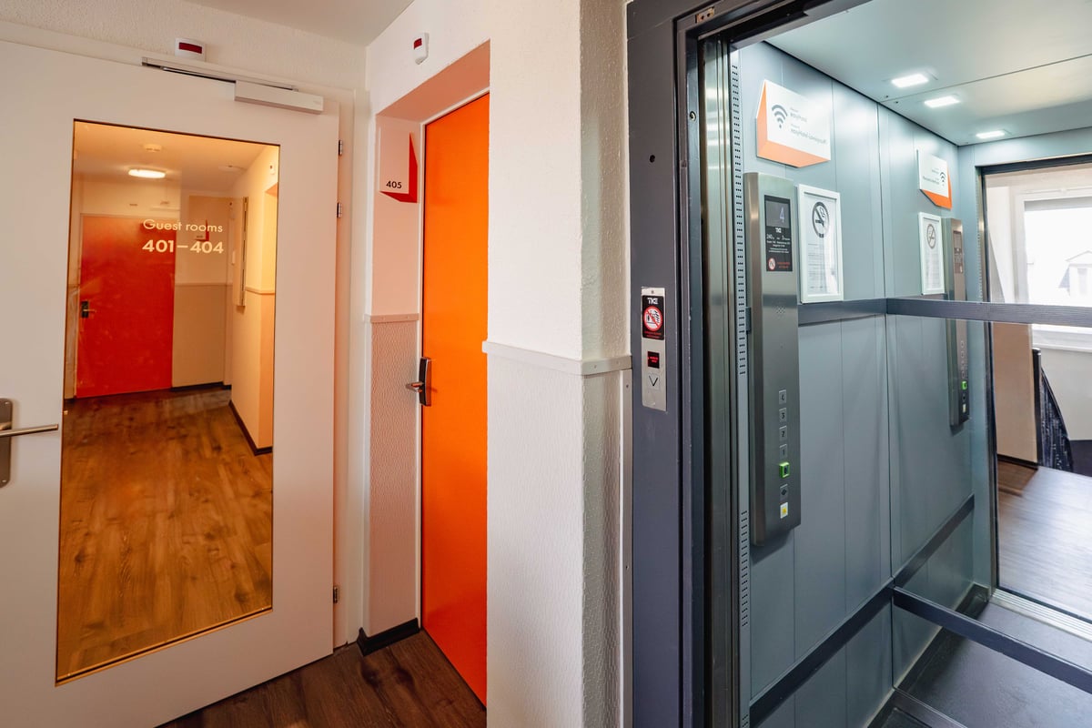 EasyHotel Zurich Main Station elevator leading to guest rooms 401-404.