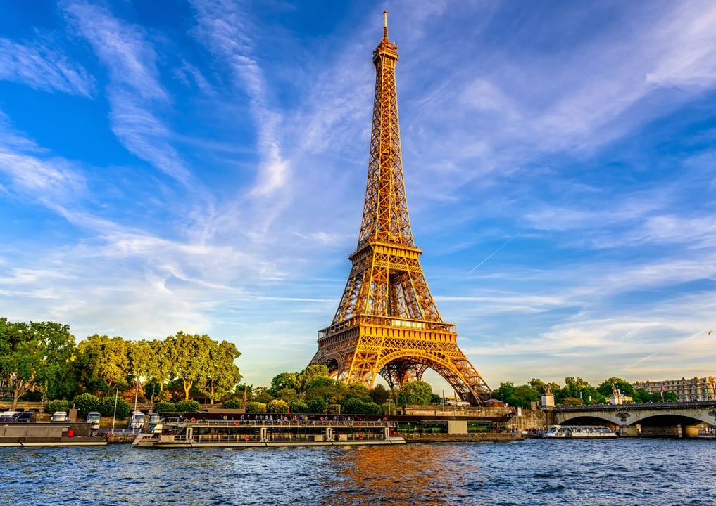 Landscape of the Paris skyline with a view of Eiffel Tower and La Seine, a famous Paris film location.